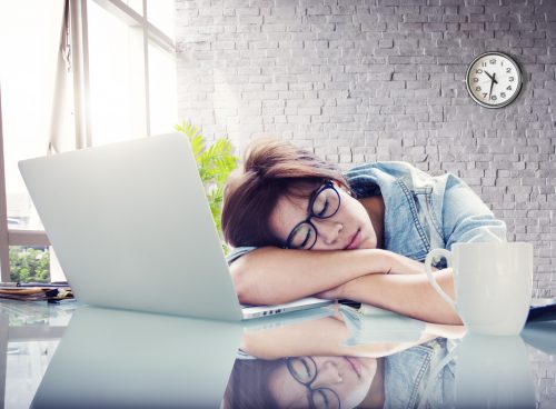 female remote employee sleeping on the job