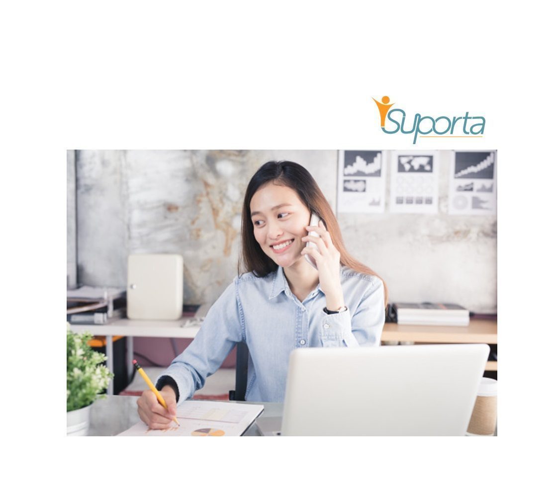 female virtual assistant working with a phone and laptop