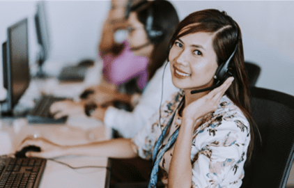 female remote employee in a headset